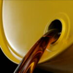 stock-footage-oil-pours-out-of-yellow-oil-barrel